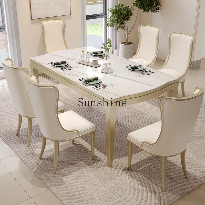 

American light luxury rock slab dining table and chair combination modern simple rectangular high-end luxury, solid wood