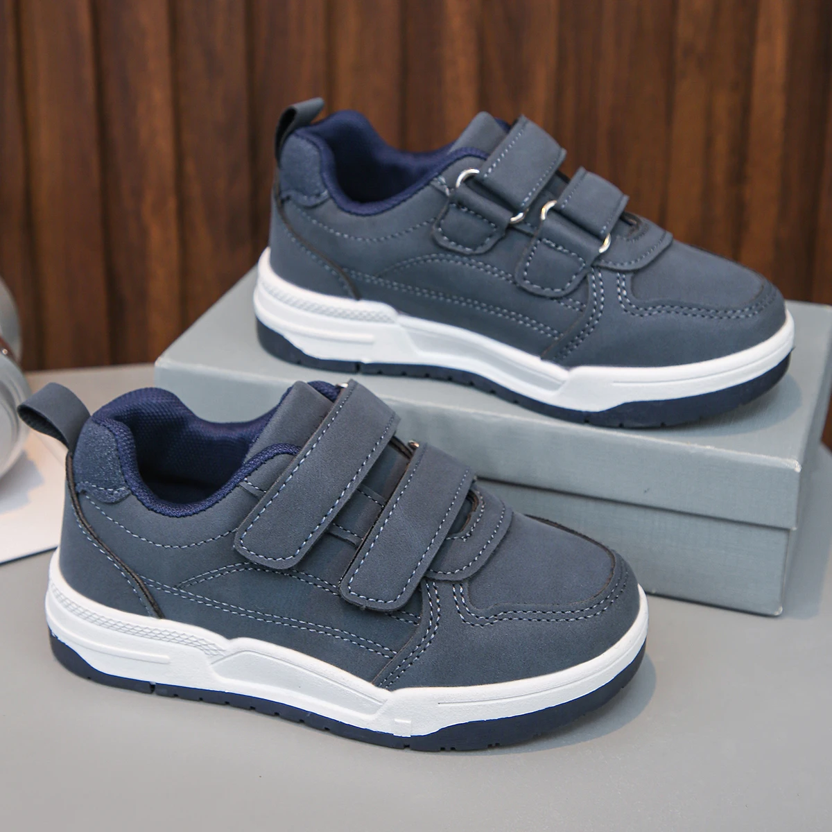 A Pair of Soft and Comfortable Casual Sneakers with Double Velcro Straps That Feel Great on the Skin