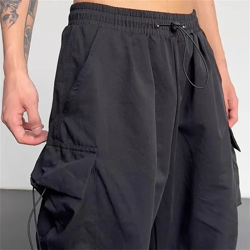 Imagen 2 del producto Pantalones Cargo informales americanos para hombre, pantalón deportivo de talla grande con bolsillos, elásticos, color negro, para primavera y verano, 46 48 50