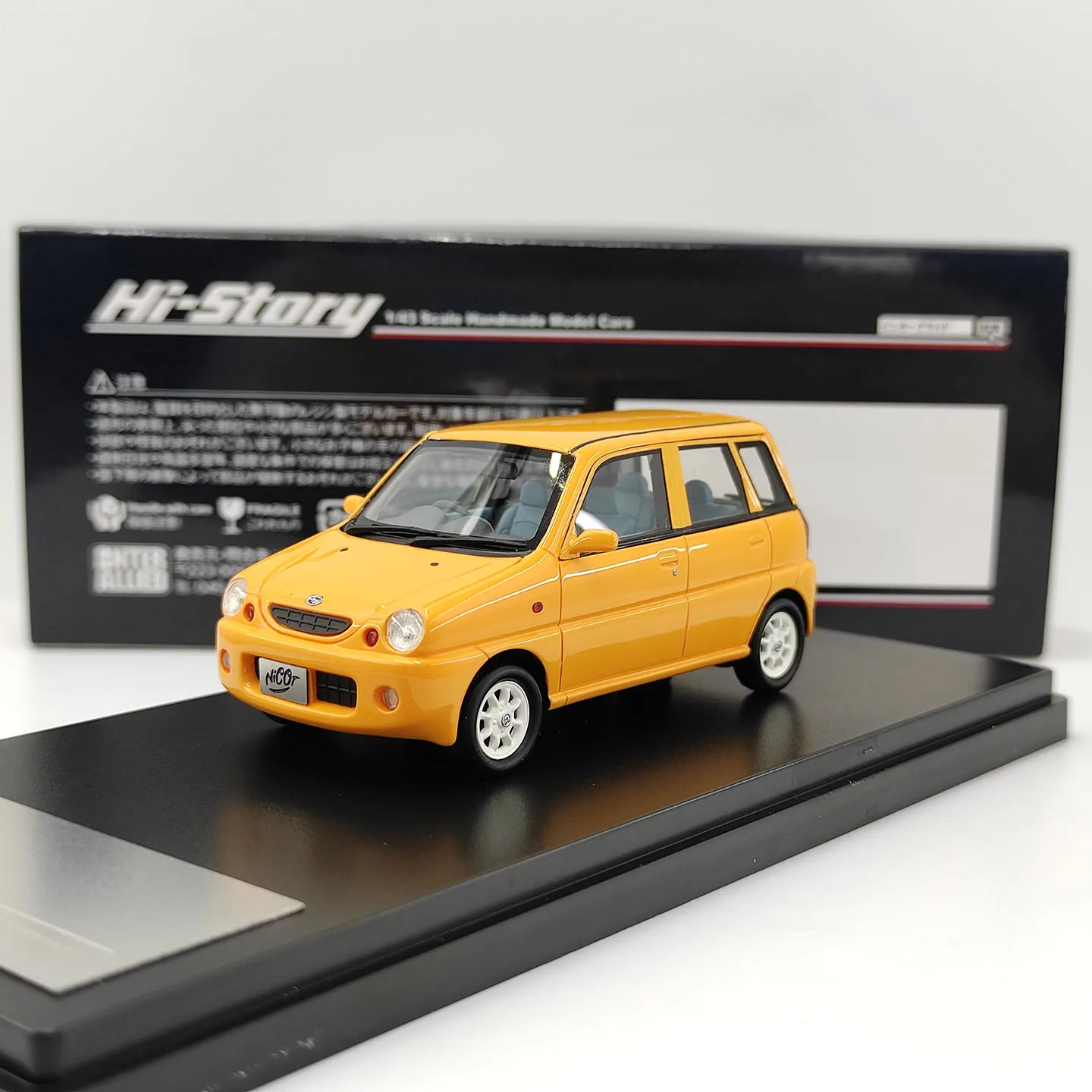 Hi-Story Modèle de voiture en résine jaune Subaru PLEO NICOT 2002 à l'échelle 1:43