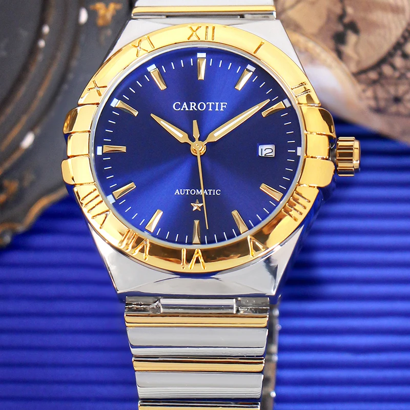 

Мужские модные часы в минималистском стиле с золотым и синим стальным ремешком, автоматическим механическим механизмом и индексными маркерами.