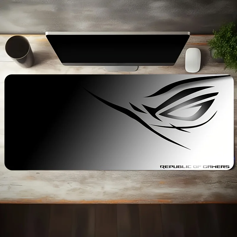 Non-Slip, Washable Rubber Base  with  A Large Gaming Mouse Pad Featuring a Black And White Gradient Eye Logo Design,