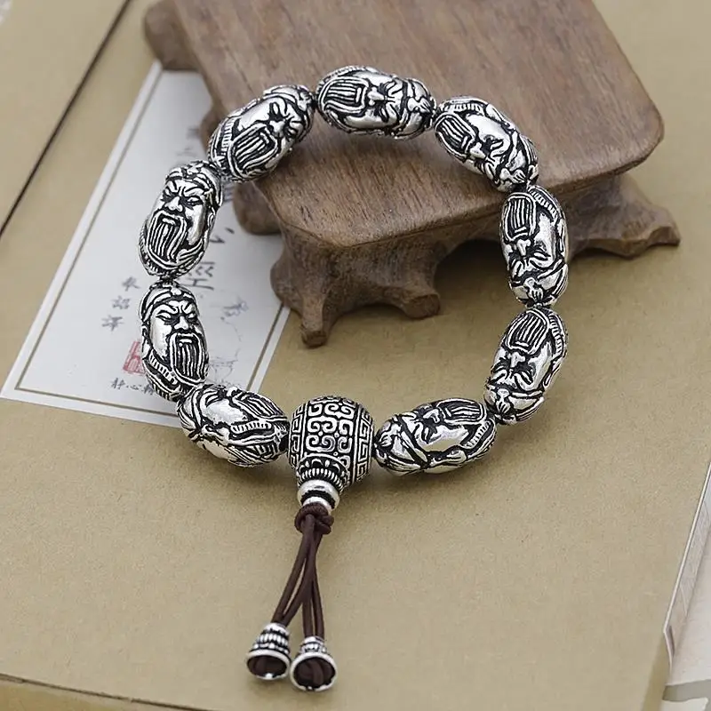 Chinese retro Tibetan silver Guan Gong carved bracelet ethnic wind Miao silver loyalty amulet