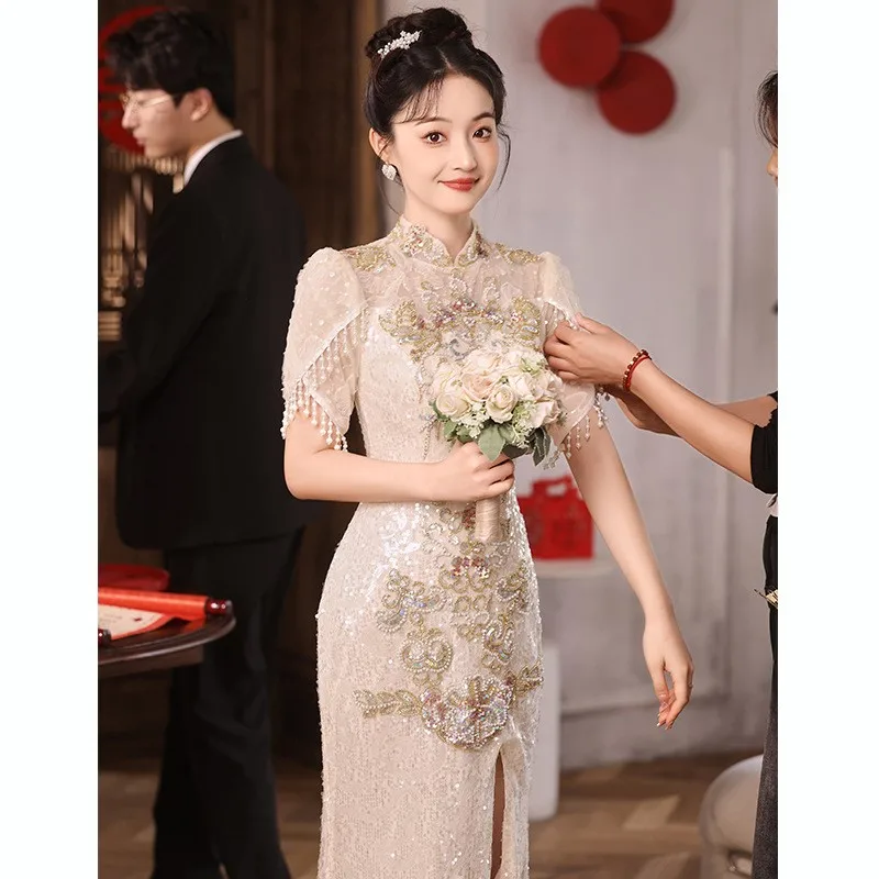 

New Chinese-style light luxury haute couture toasting and launching champagne-colored cheongsam dress