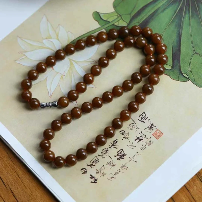 

Натуральное нефритовое ожерелье из старого материала Хотан Цемуо с полным сахарным оттенком