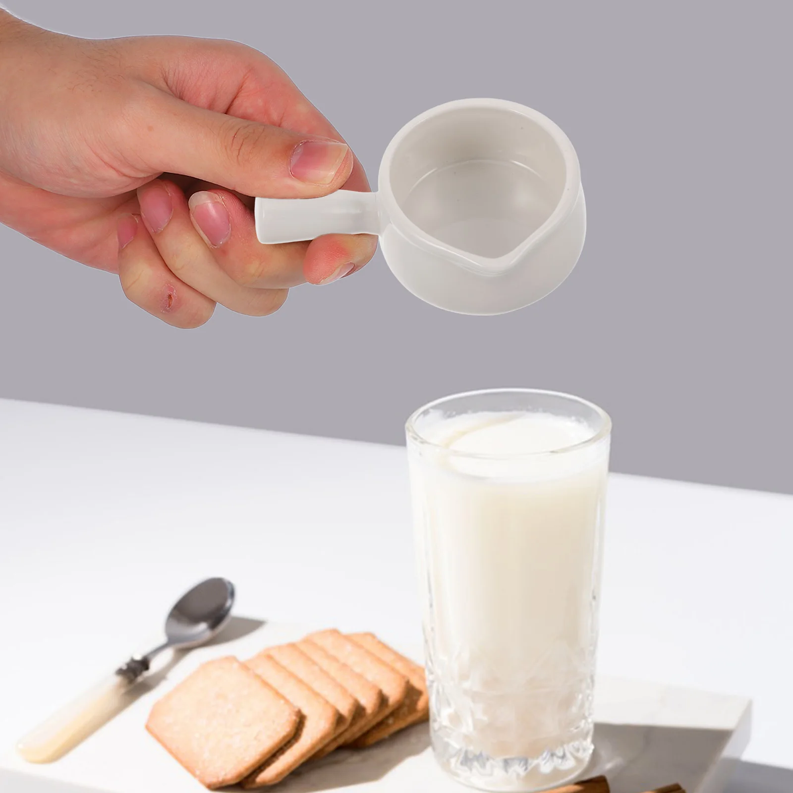

Ceramic Milk Pitcher Small 60ml Handle Sauce Bowl Creamer Seasoning Cup for Restaurant Coffee Use Small Handle Bowl