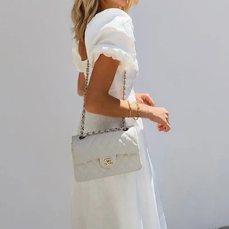 ヨーロッパとアメリカの女性のドレス夏の気質通勤 V ネック折り Tシャツ中空アウトファッション快適通気性トレンド