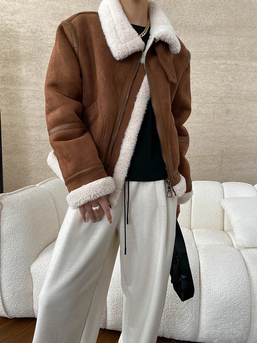 Winter women\'s casual solid color lapel long sleeved loose fur one-piece jacket