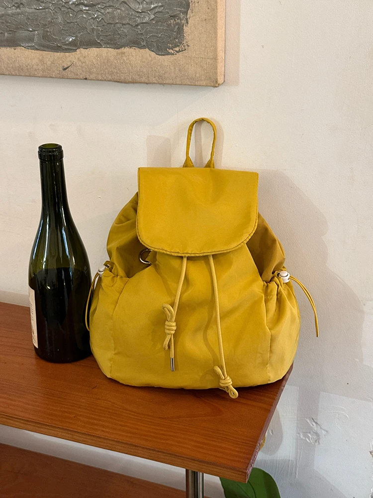 

Korean Plaid Drawstring Backpack for Women 2025 New Large Capacity Student Commuting Backpacks College Style Versatile Bag