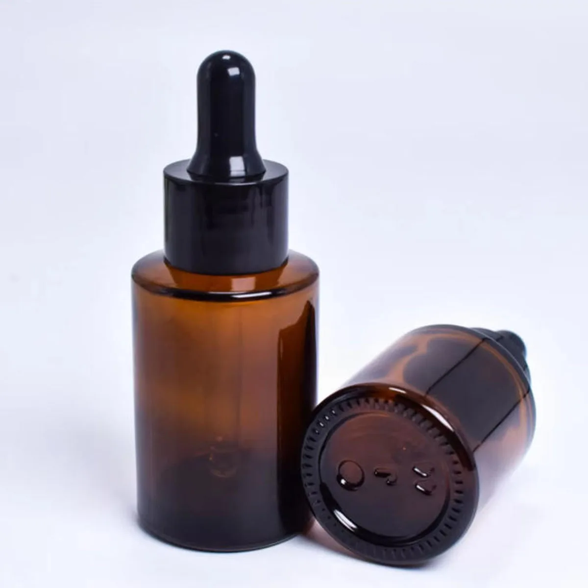 

100x 30ml Amber bottles with black caps