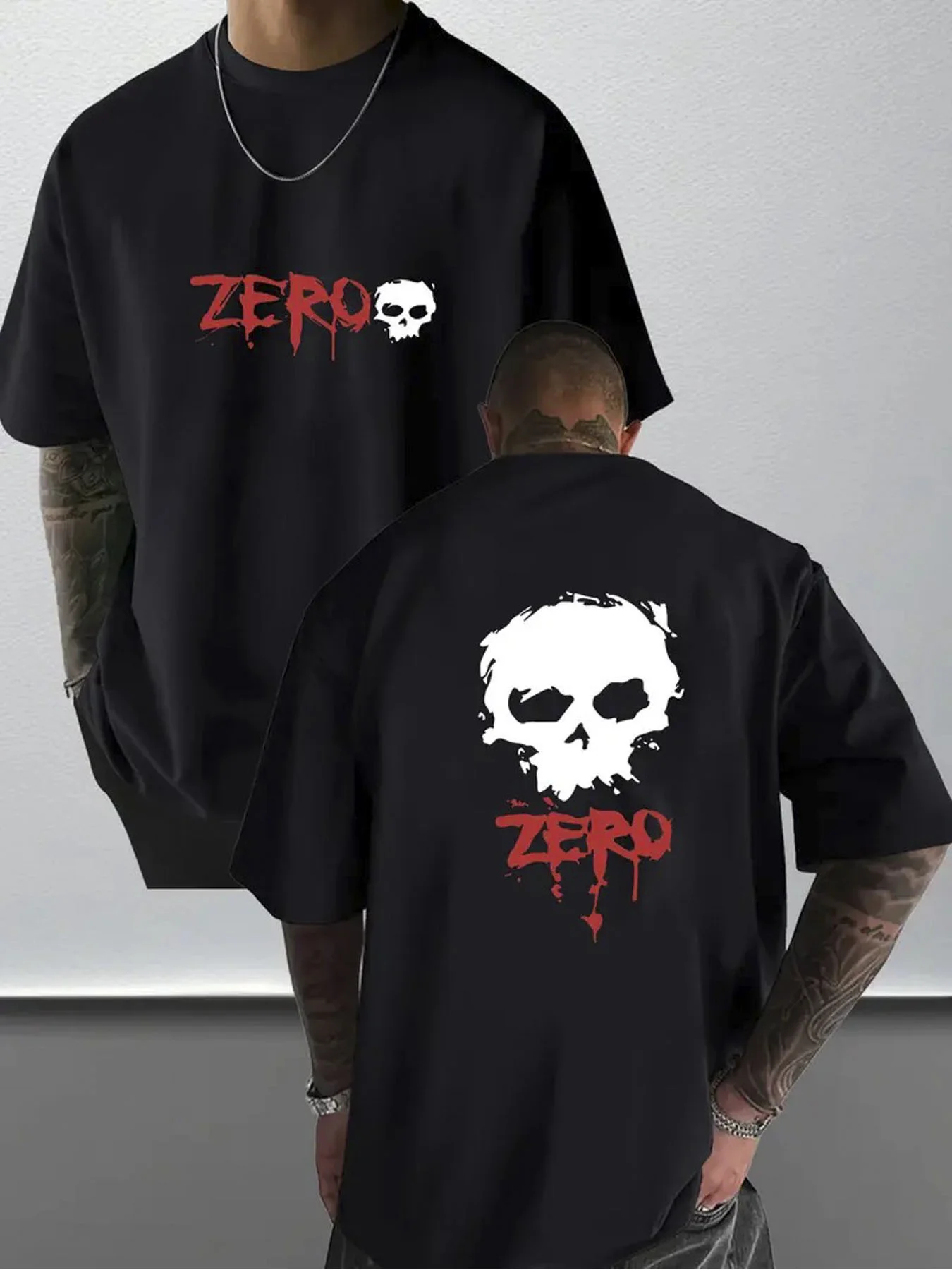 Casual Black Tee Featuring A Red 'ZERO' Print And A White Skull Design | Crew Neck Style, Distressed Larger Skull Graphic With '