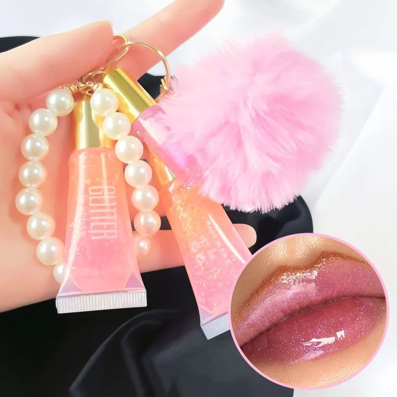 ลิปกลอสเปลี่ยนสีอุ่น 1 ชิ้น พร้อมจี้มุก ลิปออยล์ 3-in-1 สีติดทนนาน ลูกบอลน่ารัก พกพาสะดวก พร้อมกระจก