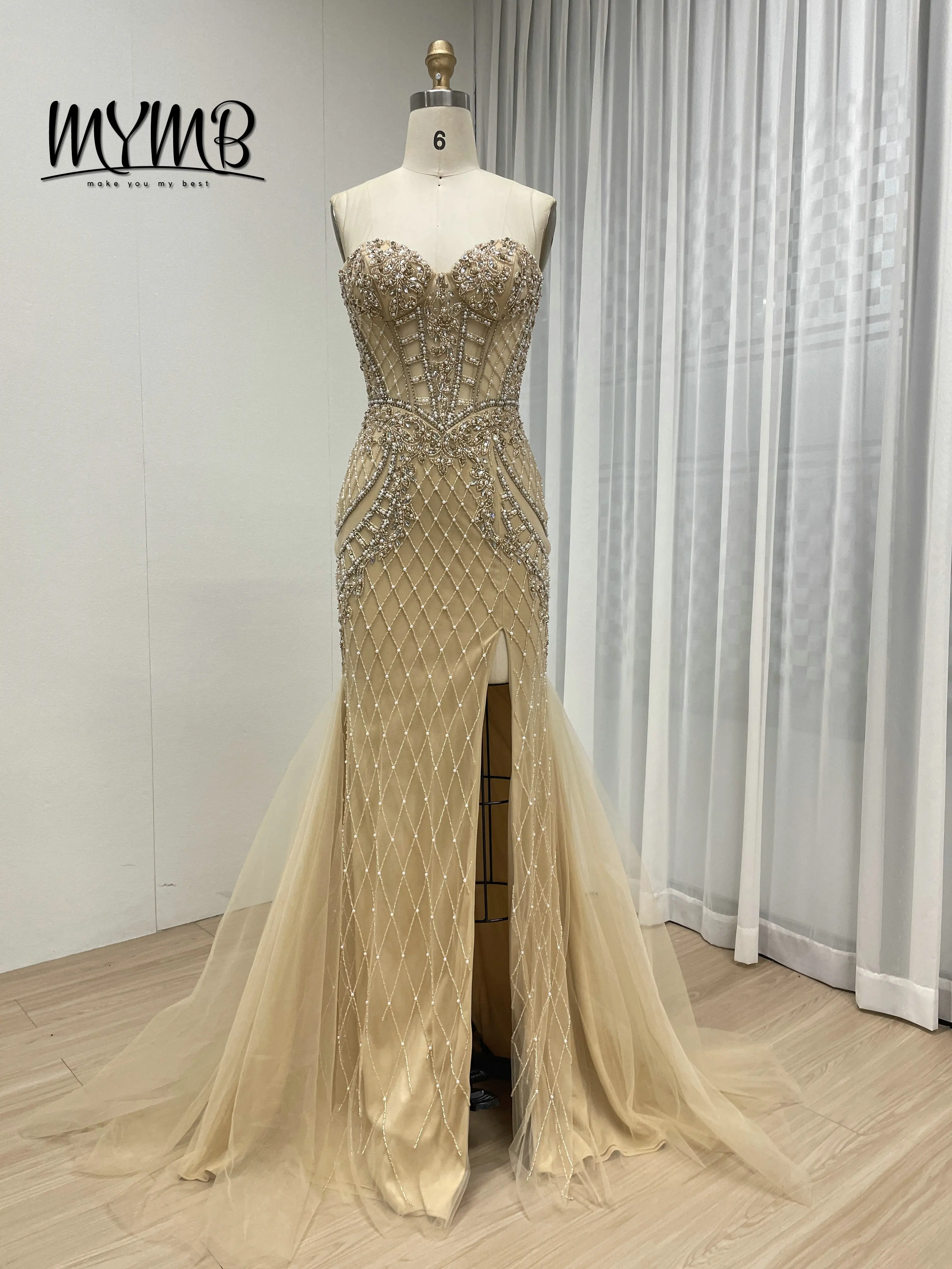 MYMB Impresionante vestido de noche sin mangas color champán dorado con entramado y cuentas de cristal corte sirena tren de tul transparente para graduación MB40406