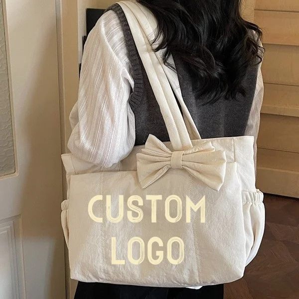 

Custom Logo Bow Decor Tote Bag Large Capacity Nylon Shoulder Bag for Women Lightweight Casual Handbag with Side Pockets Daily