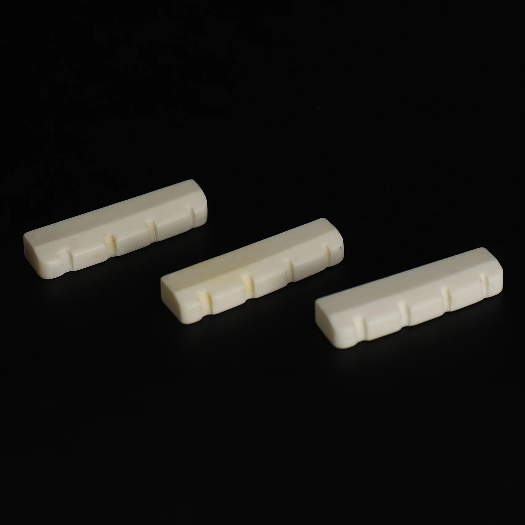 Práctica sillín y tuerca de puente de hueso para bajo de 4 cuerdas, paquete de 3