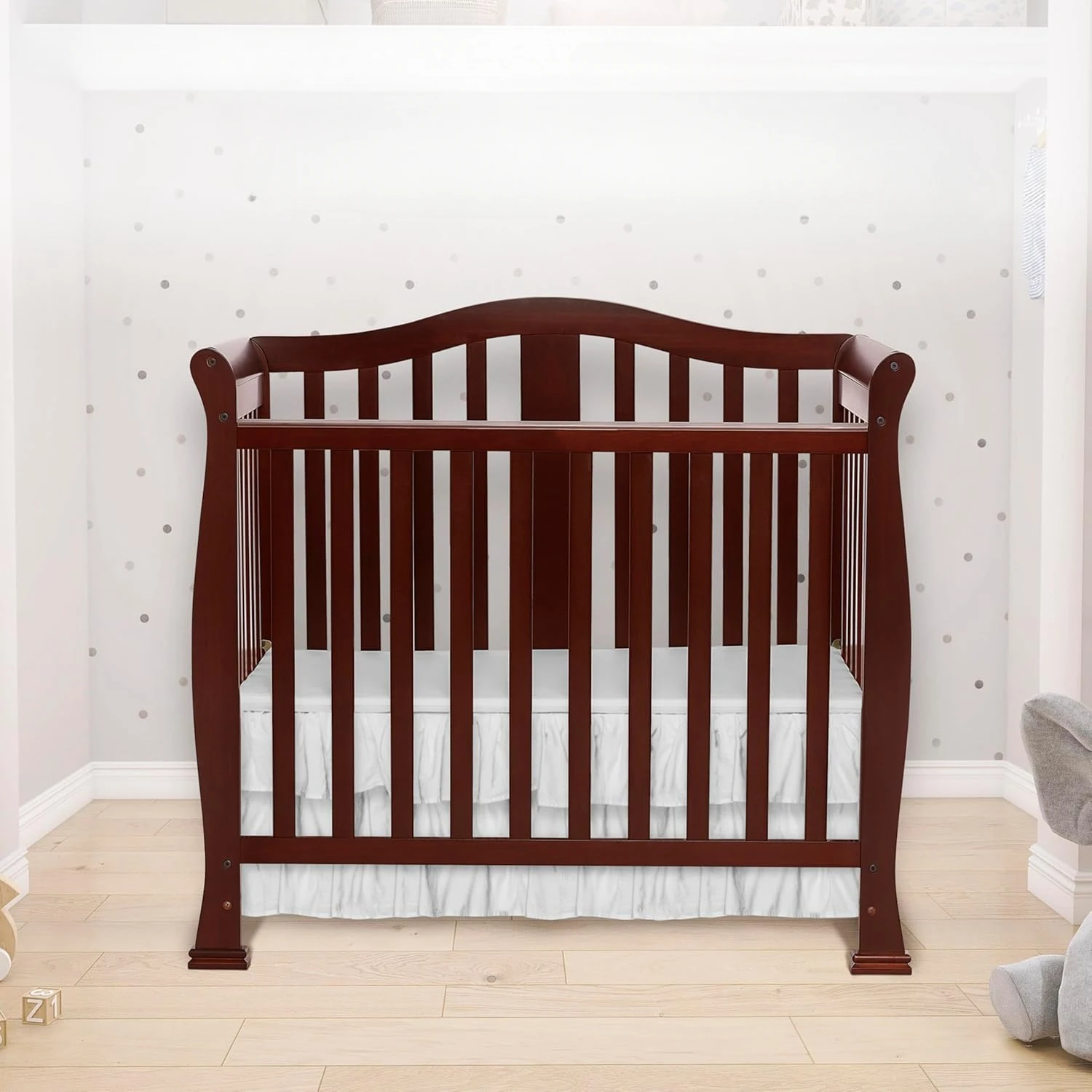 

Convertible Mini Crib in Espresso, Non-Toxic Finishes, Built of New Zealand Pinewood, Comes with 1” Mattress Pad