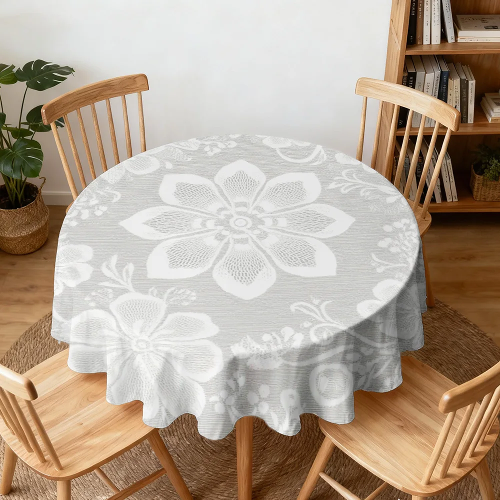 A floral design round tablecloth adds ambience to the table, perfect for holiday meals and home decor
