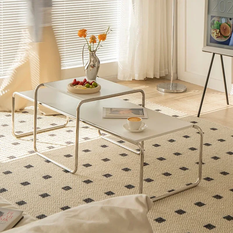 

Minimalist designer medieval stainless steel long coffee table Internet celebrities ins white edge table