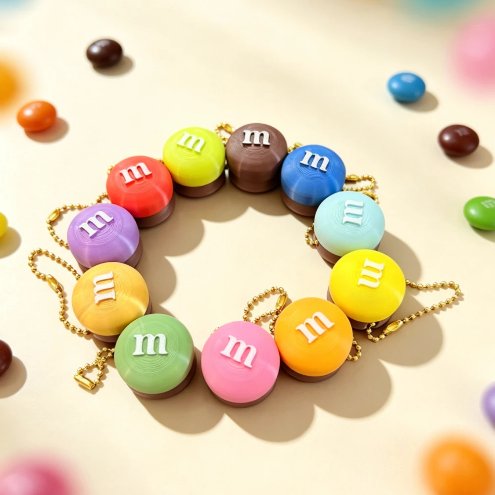 Cute M Bean 3D Printed Fidget Clicker Stress Relief Toy with Bag And Keychain Pendant - Fun Stress-Busting Accessory