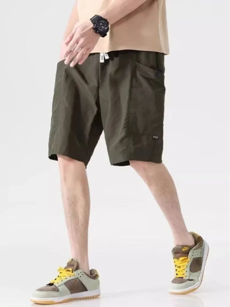 

Мужские шорты-карго-бермуды с карманами, однотонные длинные короткие брюки для мужчин с эластичной резинкой на талии, новинка из широкого нейлона, хлопка