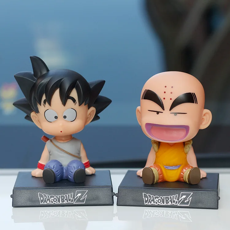 Anime Dragon Ball Z Goku Kuririn pouruszająca głową lalka Son Goku pcv akcja figurka postaci uchwyt telefonu uchwyt dekoracji samochodu prezent