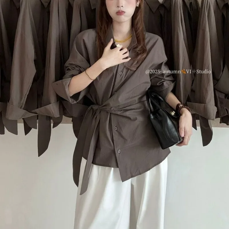 Camisas de temperamento de manga larga con tiras, nuevo estilo coreano, Tops adelgazantes de cintura con diseño de moda para primavera y otoño, versátiles