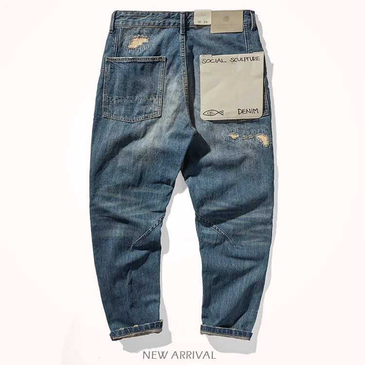 Autunno inverno New American Retro Holes Patch Cargo Denim Jeans uomo Trendy 100% cotone lavato vecchi pantaloni Casual pesanti