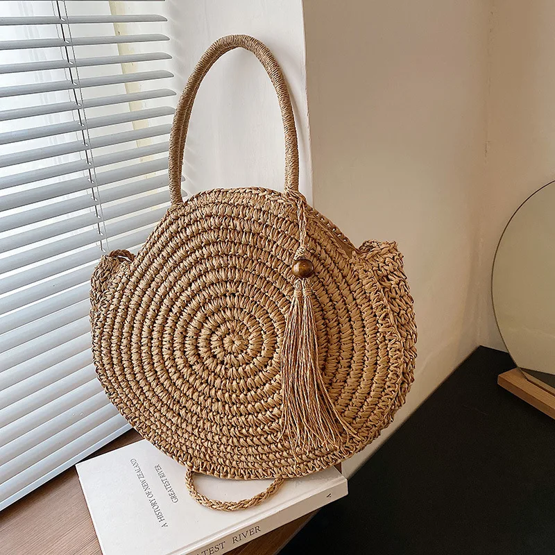 Bolso de paja redondo Vintage para mujer, bandolera con borlas, tejido, informal, hecho a mano, para playa y verano, 2024