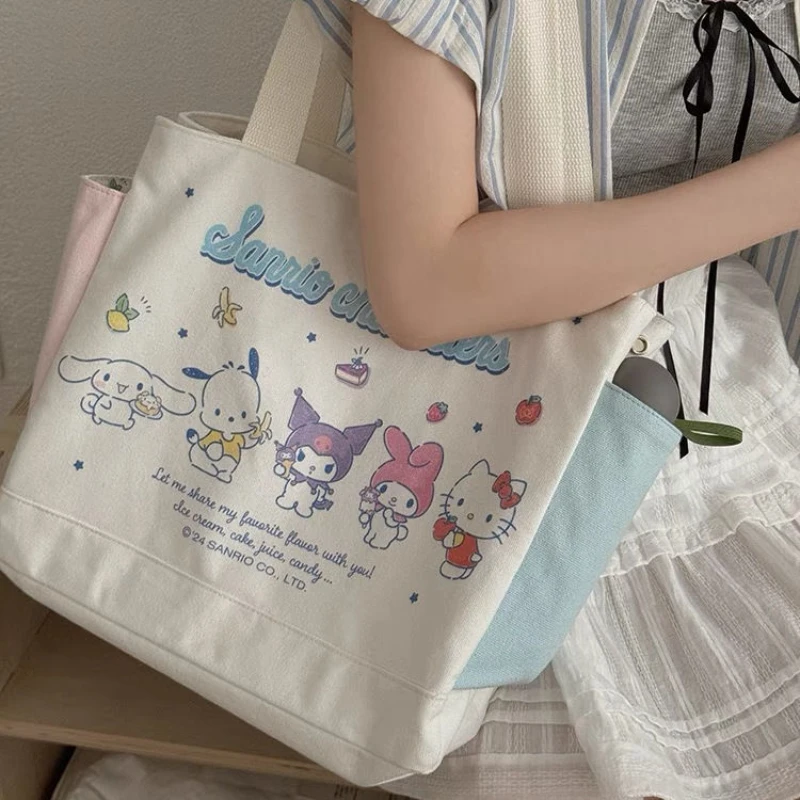 

Sanrio Hello kitty Large Canvas Bag Shoulder Hand-held Commuter Bag Student Large Capacity Printed Y2K Tote Bag For Girls Women