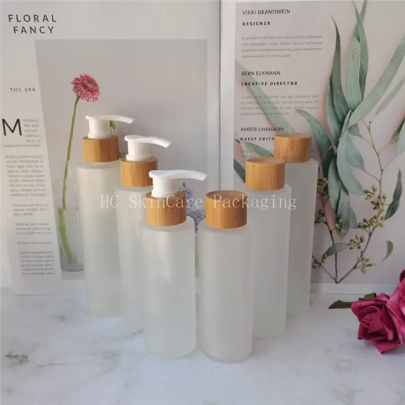 

whosesalehigh quality Shampoo Bottles Wholesale Frosted Glass Empty Toner Spray Bottle Natural Bamboo Refillable reacycle Bottle