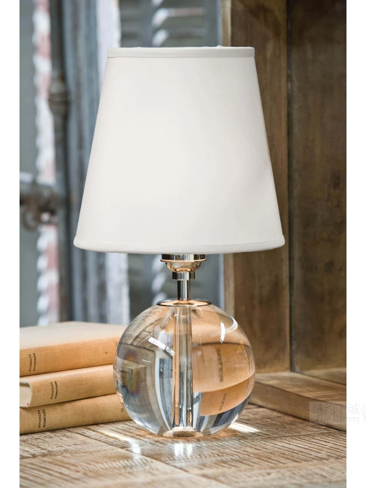 New york Downtown Park imported heavy Odyssey elegant crystal ball bedroom decorated with small desk lamp bedside.