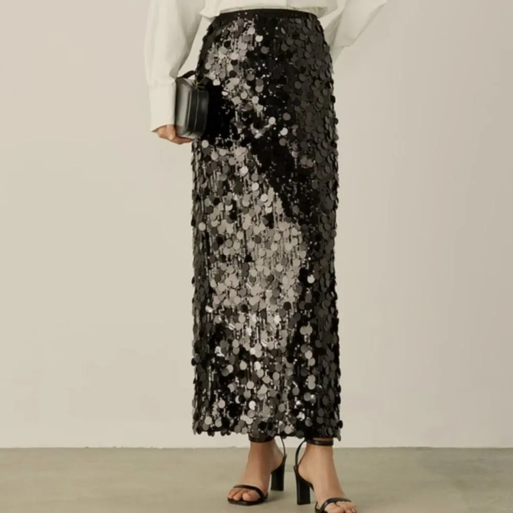 Autumn new elegant style sequin black straight through long skirt for women