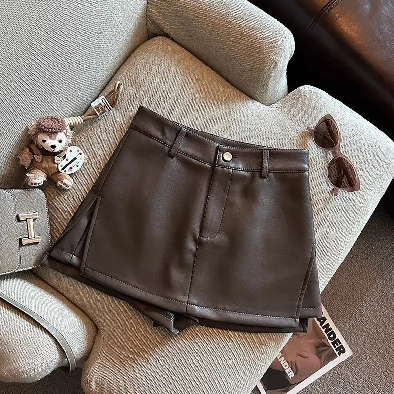 กระโปรงหนัง PU วินเทจทรงเอ สั้น เอวสูง แฟชั่นผู้หญิง สำหรับฤดูใบไม้ร่วงและฤดูหนาว ทรงเข้ารูป สไตล์สตรีทแวร์ รุ่นใหม่