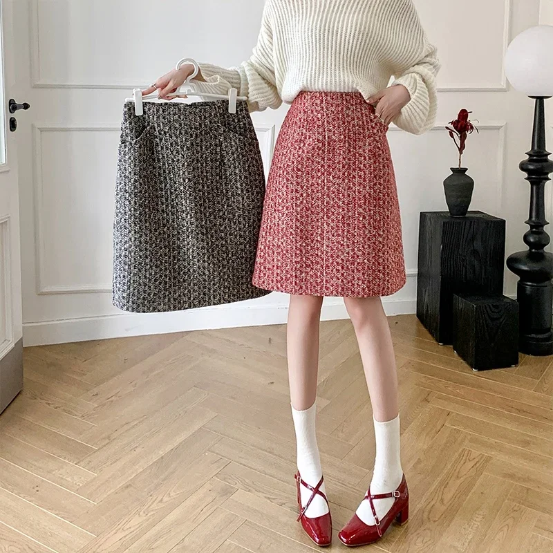 Xiaoxiangfengmao, 2024 autumn and winter high waisted hip hugging short skirt, A-line skirt, half length skirt, mid length skirt