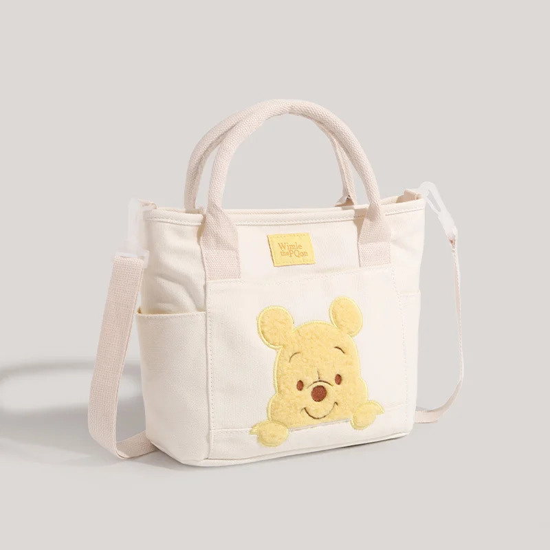 Disney Winnie the Pooh cartoon cute large capacity white canvas messenger bag women's casual wear-resistant shoulder handbag