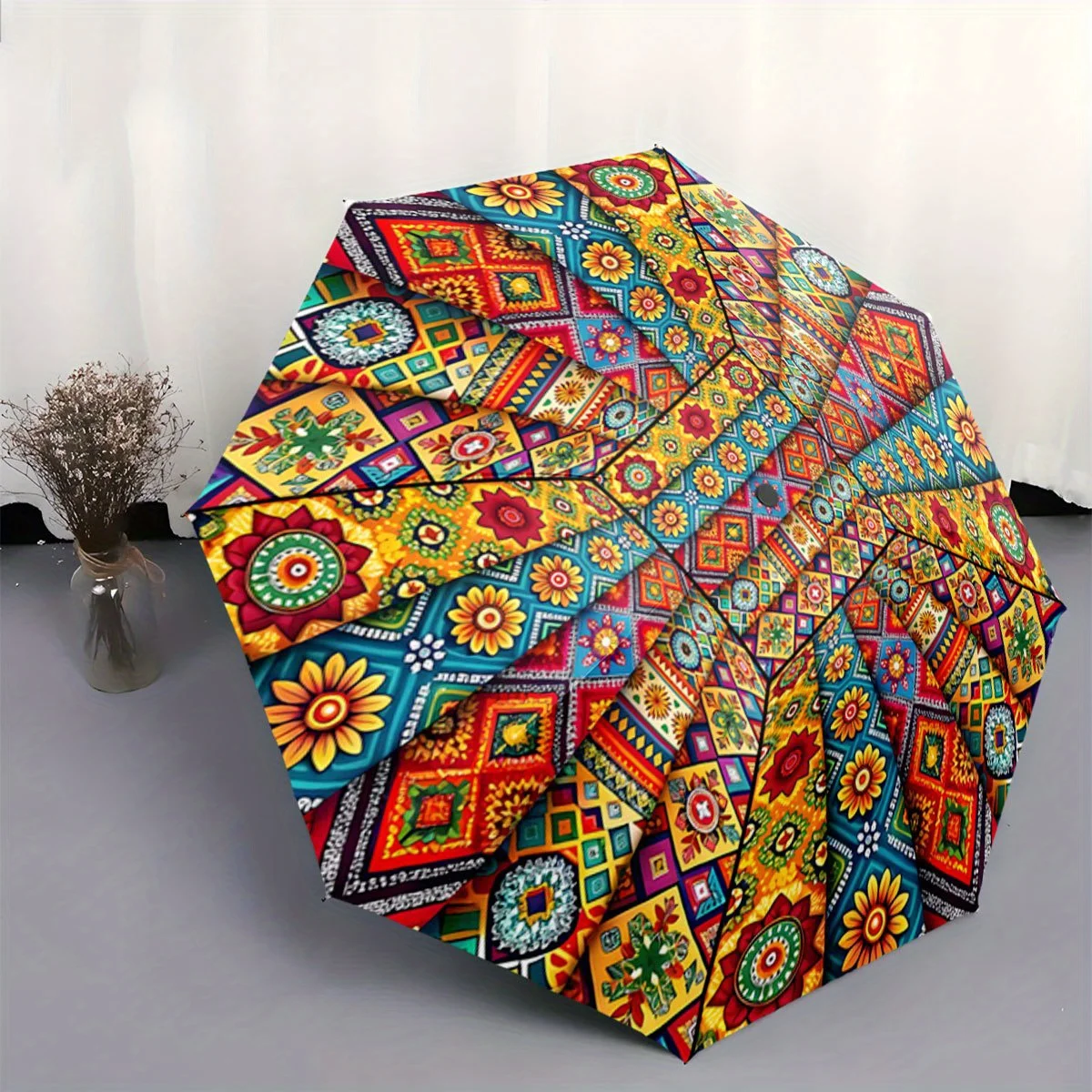 

Automatic Folding Umbrella Colorful floral and geometric patchwork pattern. Portable collapsible design, casual outdoor access