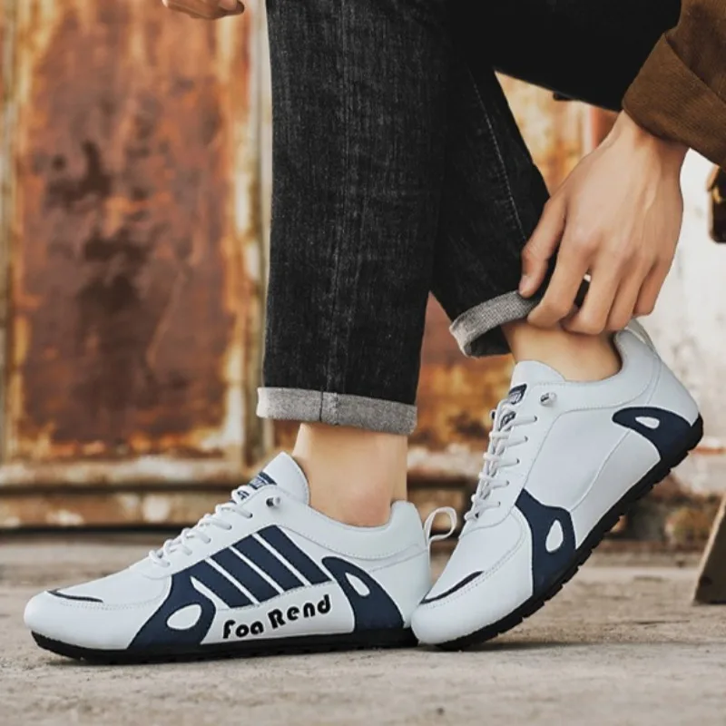 أحذية للرجال موضة حذاء رياضة كاجوال عدم الانزلاق الراحة الاتجاه تشغيل حذاء لينة وحيد تنفس أحذية جلدية للرجال Zapatillas Hombre