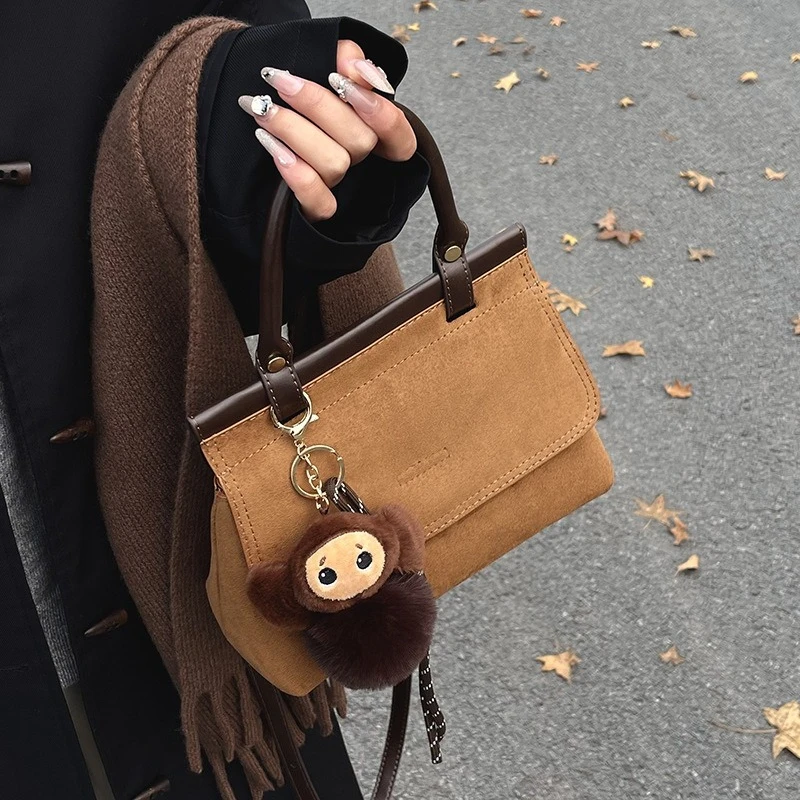 

Супер популярная нишевая замшевая матовая сумка для женщин, осень-зима 2026, новая универсальная сумка через плечо, ручная маленькая сумка в стиле ретро