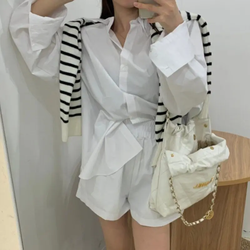 

Женский комплект Dongda Gate: свободная блузка с длинным рукавом и брюки с высокой талией и широкими штанинами, с вырезами и завязками, весенняя мода