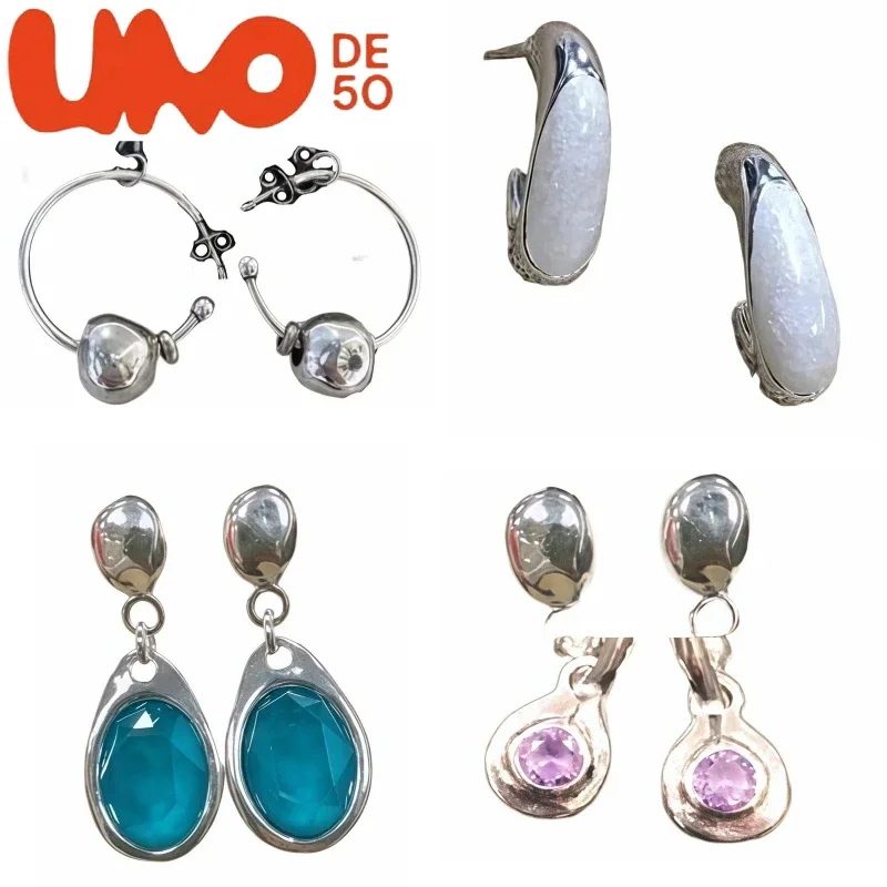 أقراط UNOde50 الأنيقة: ذهبي وفضي عيار 24 قيراط، مظهر فاخر بقيمة رائعة