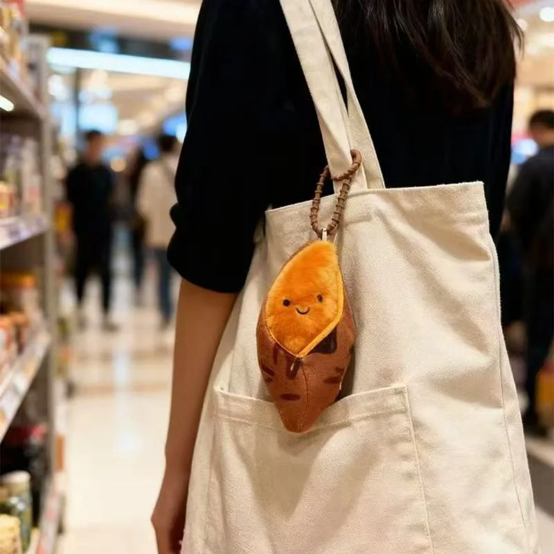 Neue süße gebackene süße Kartoffel Plüsch Puppe Schlüsselanhänger hängen Mädchen Herz Dekoration Winter Kinder Geschenke.