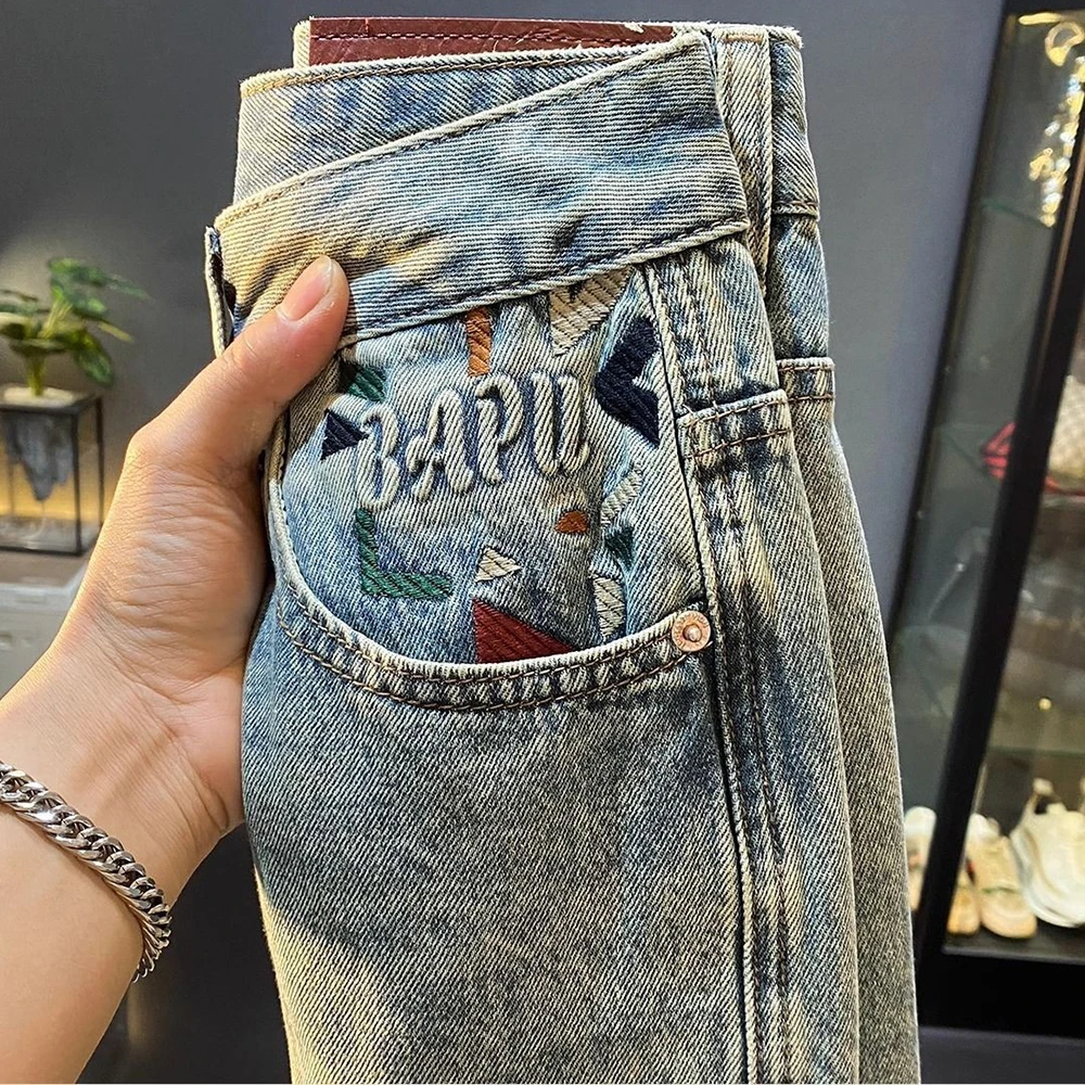 夏の新メンズソリッドカラーハーレムスキニージーンズアメリカンレトロファッショントレンドストリートヒップホップカジュアル通気性メンズボトムス