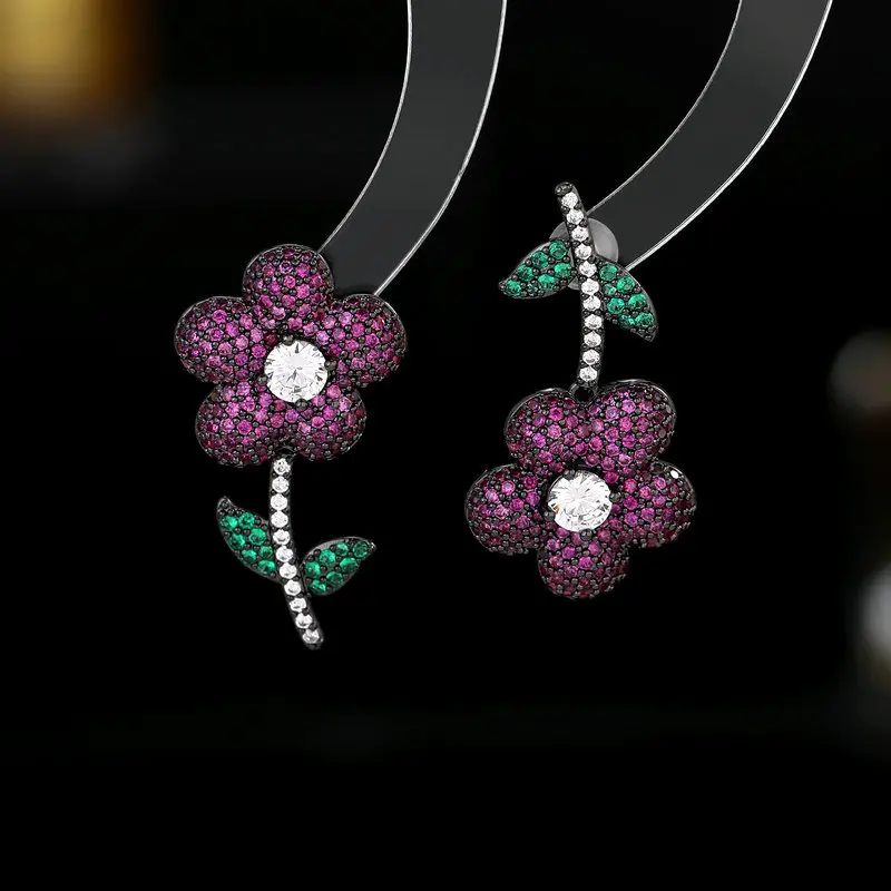 

Wholesale of s925 silver needle zirconia inlaid with niche design and high-end floral stud earrings
