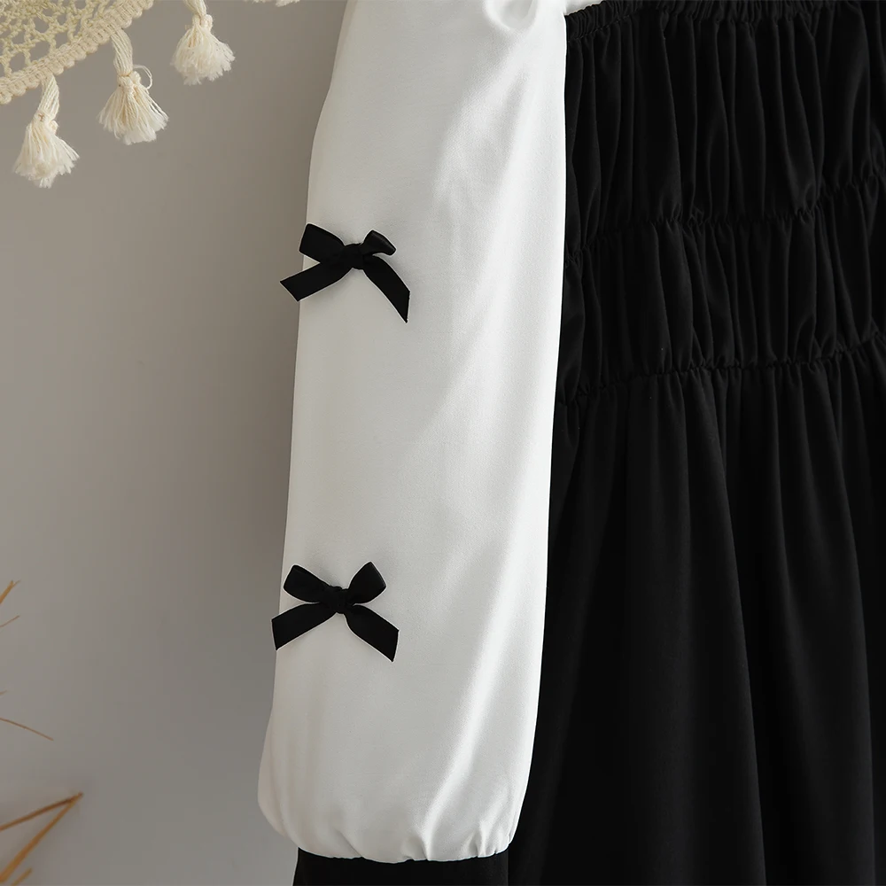 ชุดเดรสลำลองเด็กผู้หญิง สไตล์มินิมอล สีดำขาว สำหรับเด็กอายุ 3-7 ปี รุ่นใหม่ประจำฤดูใบไม้ร่วง ดีไซน์ตัดสี แต่งโบว์ แฟชั่นทันสมัย