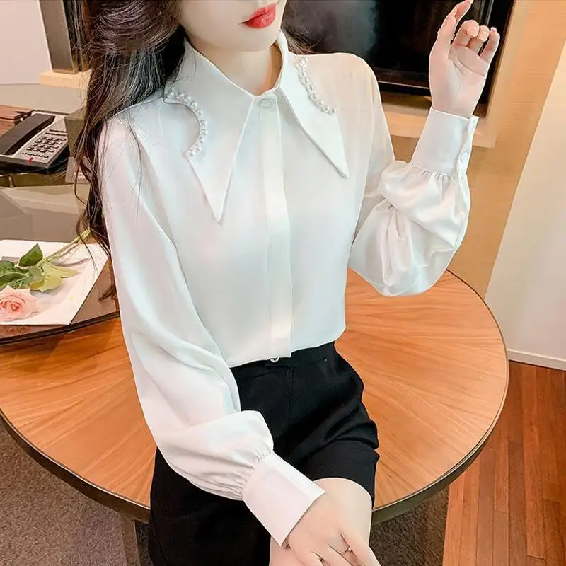 Elegant Lapel Button Lantern Sleeve Beading Shirt Women\'s Clothing 2022 Autumn New Loose Sweet Tops All-match Office Lady Blouse