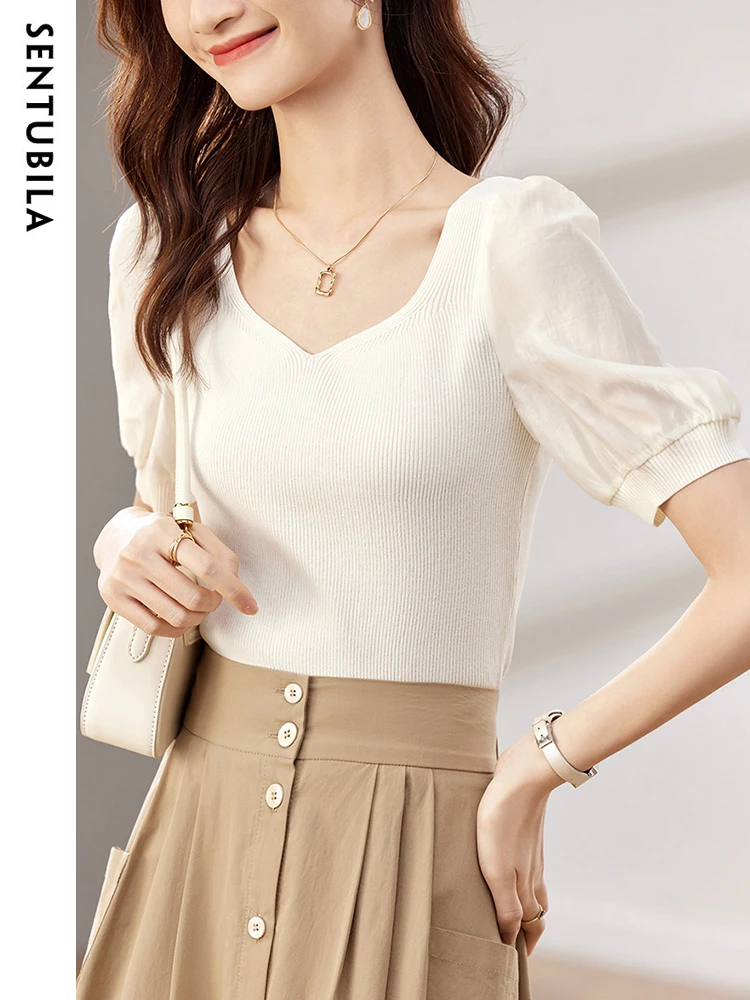 

Женский трикотажный свитер с короткими рукавами-фонариками и V-образным вырезом