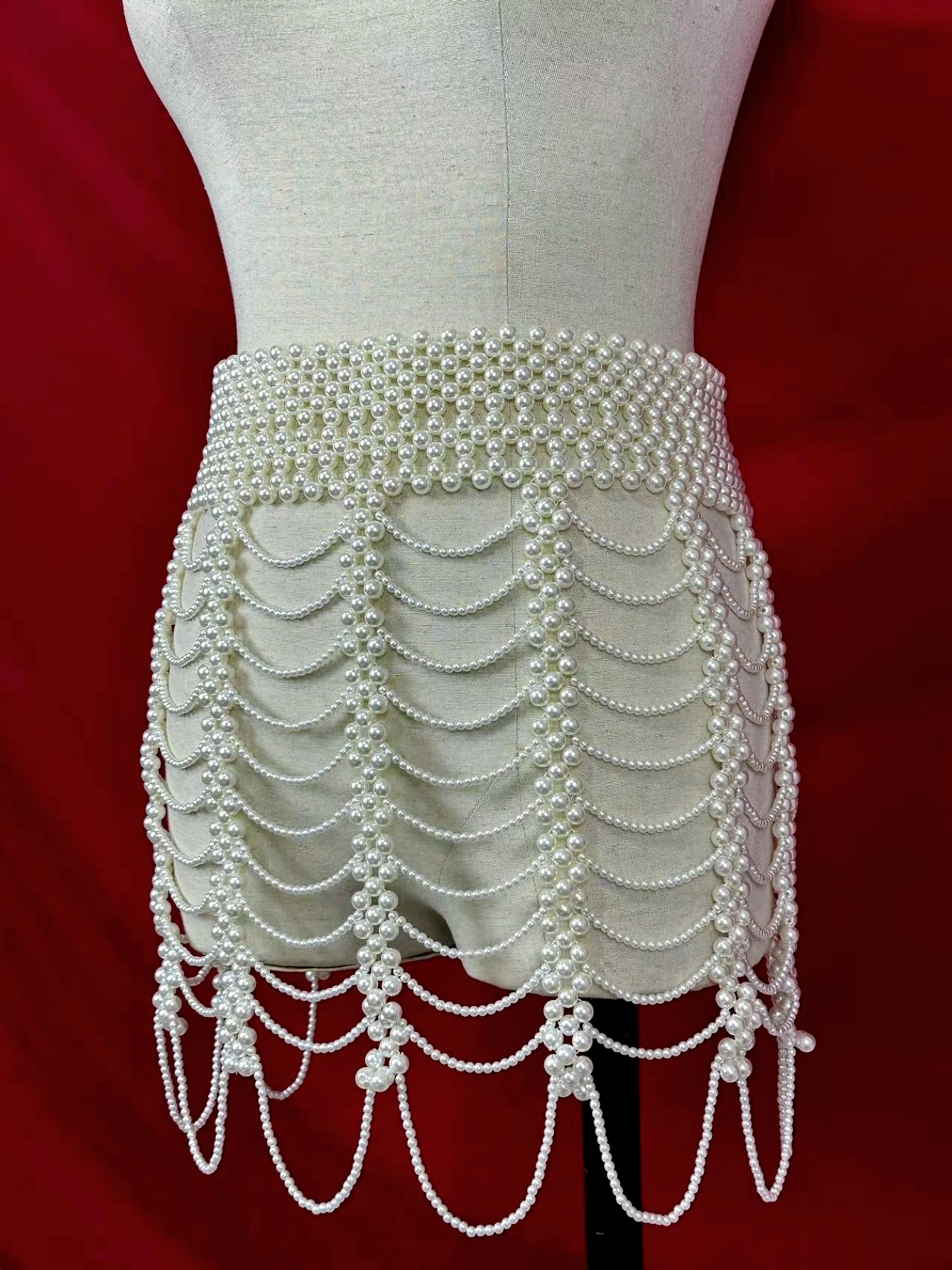 1ชิ้นสินค้าใหม่เปิดตัวชุดเดรสไข่มุกปลอมประดับลูกปัดเซ็กซี่สำหรับสตรีชุดเดรสชายหาดวันหยุดบาร์โซ่ประดับร่างกายเครื่องประดับหรูหรา ACC