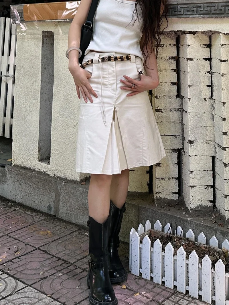 Amerikanischer Retro-Rock in Weiß für Damen, 2022, Sommer, Spicy Girl, unebene Falten, mittellanger A-Linien-Rock, Midirock mit hoher Taille