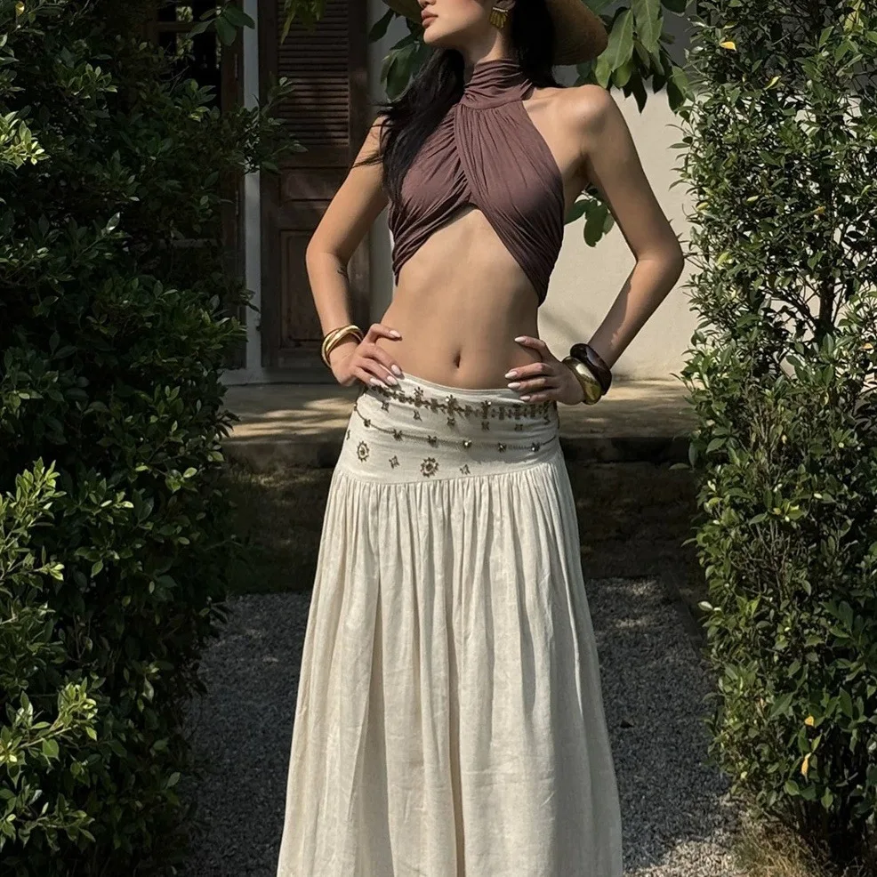 Gonne da donna Set da due pezzi 2025 Gonna retrò per le vacanze Beige a vita bassa Gonna lunga a linea A Set canotta da donna leggera