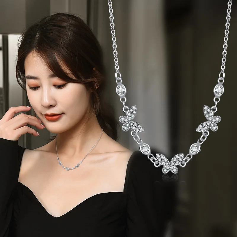 A brand-new simple three-butterfly single-layer collarbone chain necklace exudes a sweet feminine charm